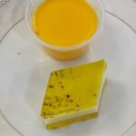 mango pudding dessert set on a white plate from Tong Tak Restaurant