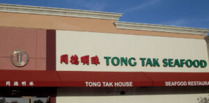 Tong Tak House sign on building
