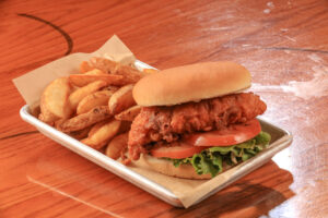 chicken sandwich on a platter with fries from Clearman's Galley 