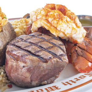 filet minon with lobster tail on a platter from Clearman's North Woods Inn
